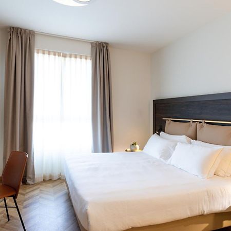 Hatelier Garda Home By Enjoy Garda Hotel بسكييرا ديل غاردا المظهر الخارجي الصورة