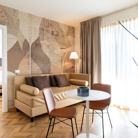 Hatelier Garda Home By Enjoy Garda Hotel بسكييرا ديل غاردا المظهر الخارجي الصورة