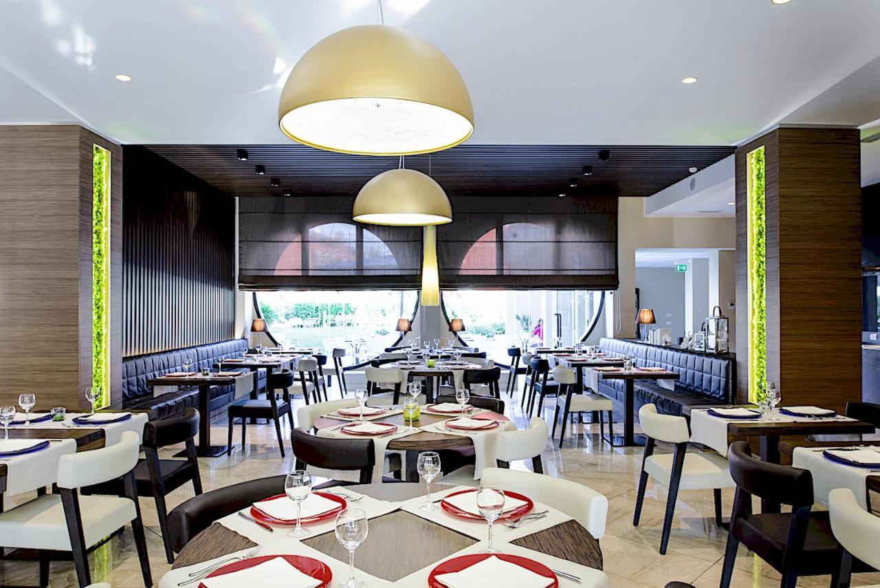 Hatelier Garda Home By Enjoy Garda Hotel بسكييرا ديل غاردا المظهر الخارجي الصورة
