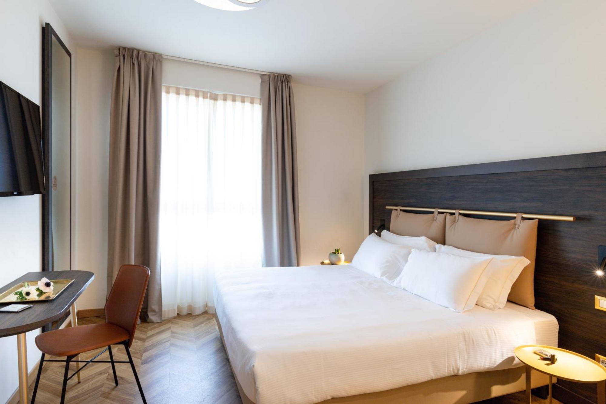 Hatelier Garda Home By Enjoy Garda Hotel بسكييرا ديل غاردا المظهر الخارجي الصورة