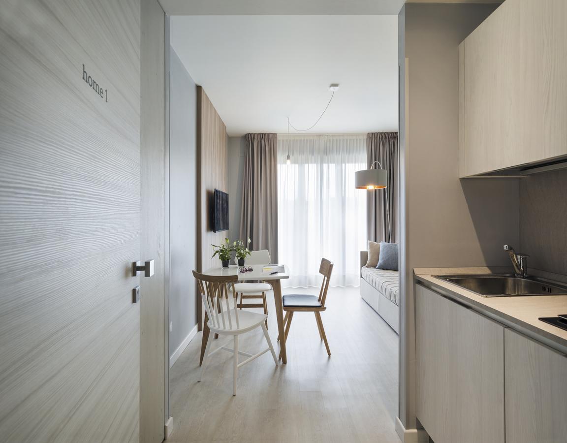 Hatelier Garda Home By Enjoy Garda Hotel بسكييرا ديل غاردا المظهر الخارجي الصورة