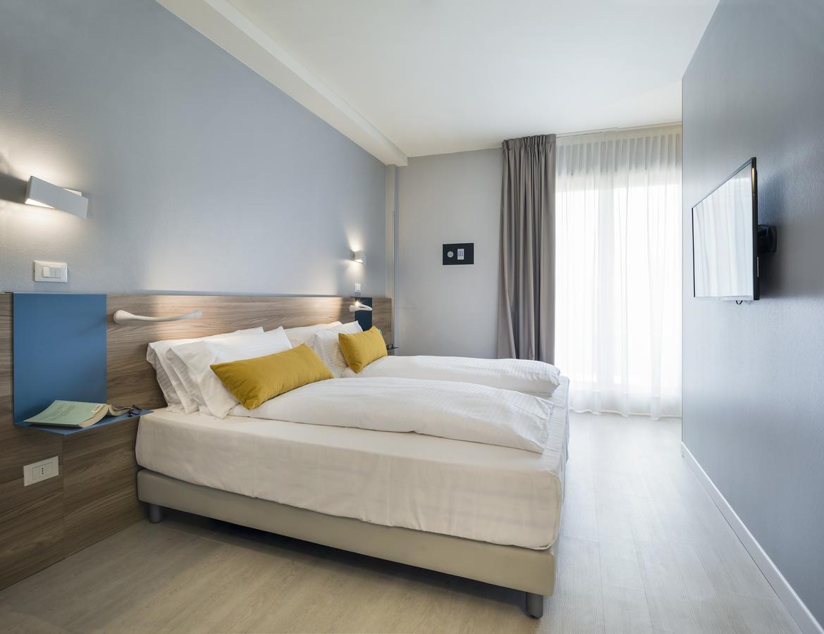 Hatelier Garda Home By Enjoy Garda Hotel بسكييرا ديل غاردا المظهر الخارجي الصورة