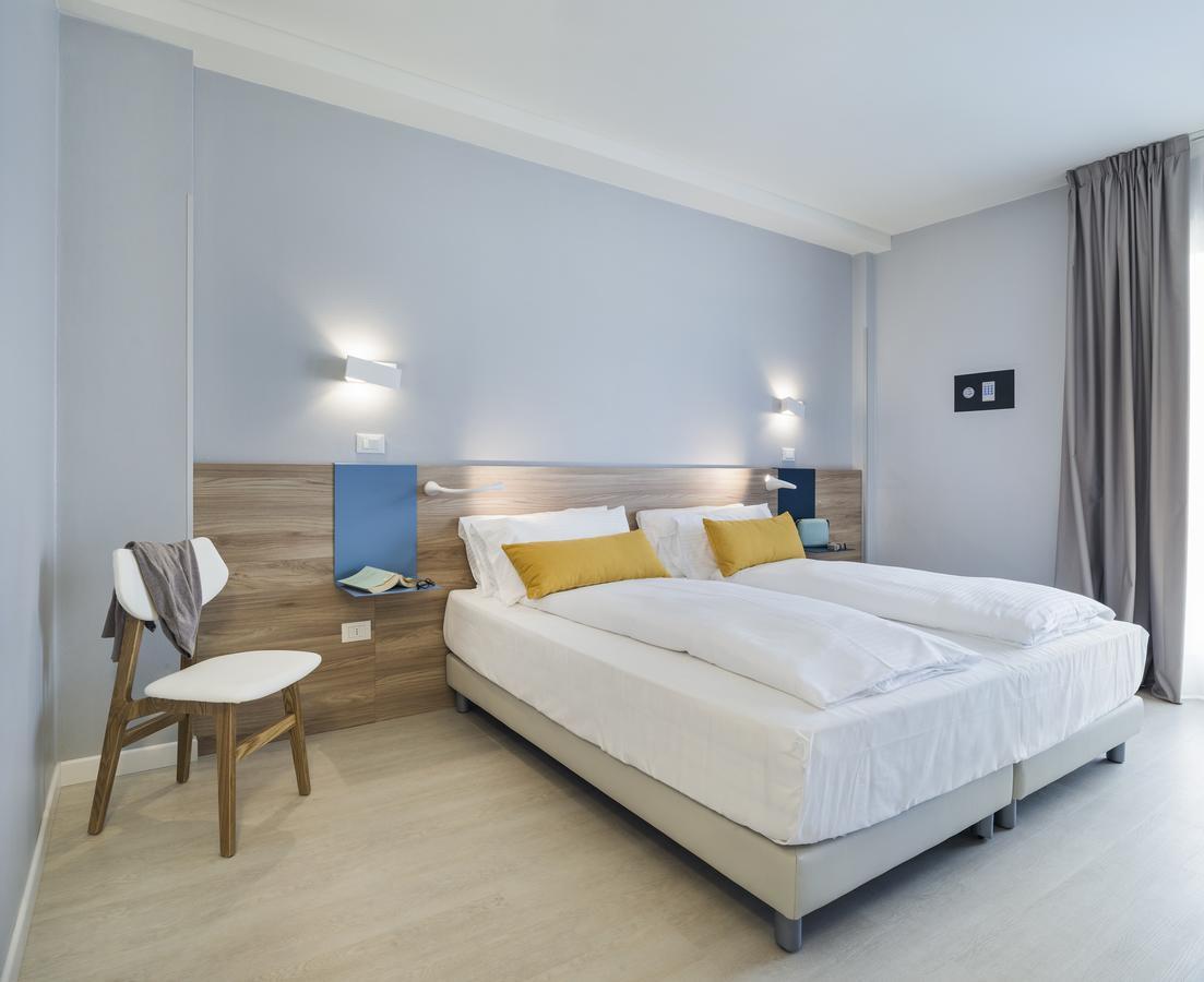 Hatelier Garda Home By Enjoy Garda Hotel بسكييرا ديل غاردا المظهر الخارجي الصورة