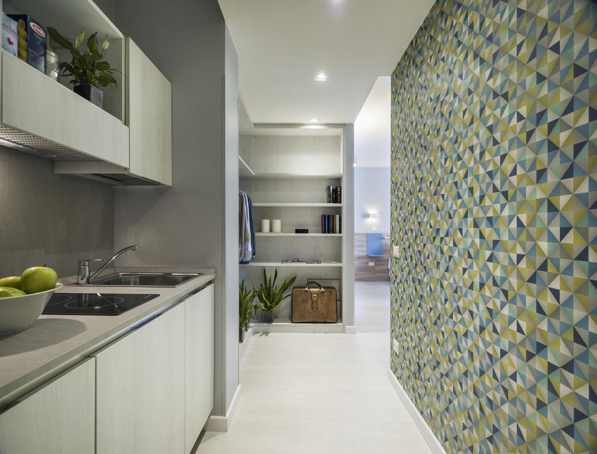Hatelier Garda Home By Enjoy Garda Hotel بسكييرا ديل غاردا المظهر الخارجي الصورة